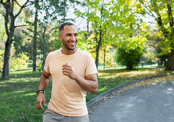 A 35-year old man is on a run in the park