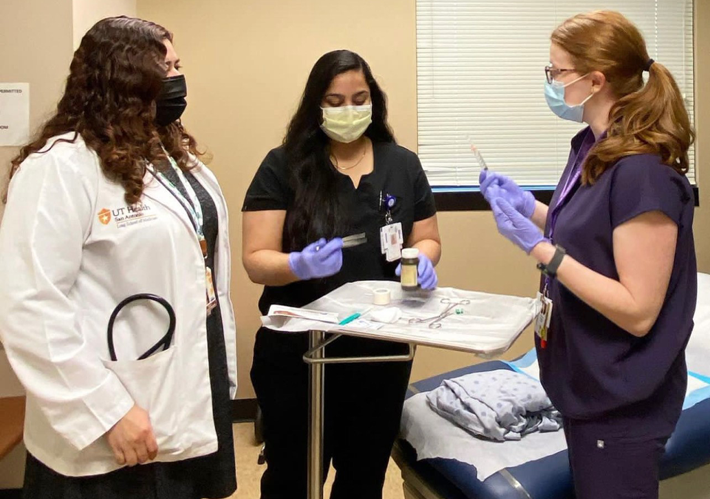 Three residents participating in a training 