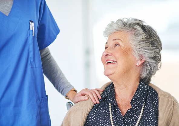 An elder white lady about to get a calcium score test