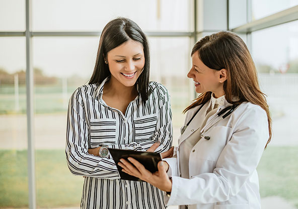 A woman talking to her OB-GYN